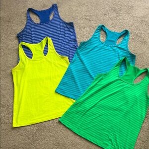 Danskin Lot of 4 Women's Dri-Fit Striped Razorback Tank Tops- size Medium